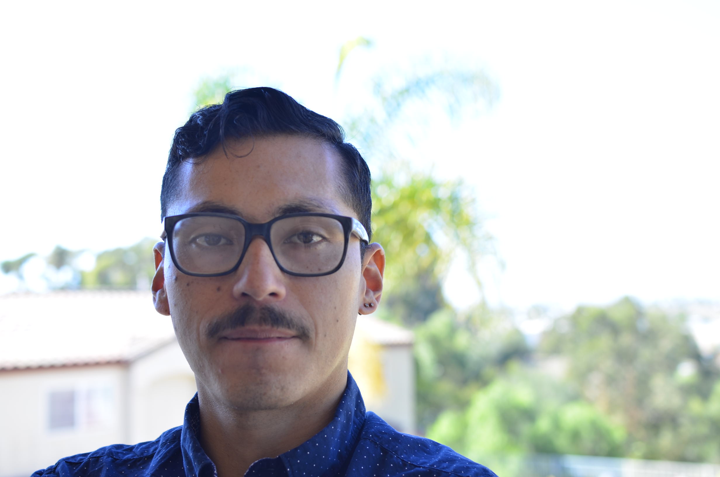 A photo of Miguel A. Avalos looking straight at the camera.