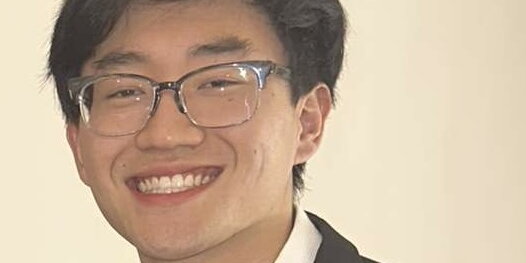 A photo of Brandon Bae smiling at the camera