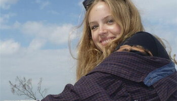 A photo of Joya Weissman smiling at the camera