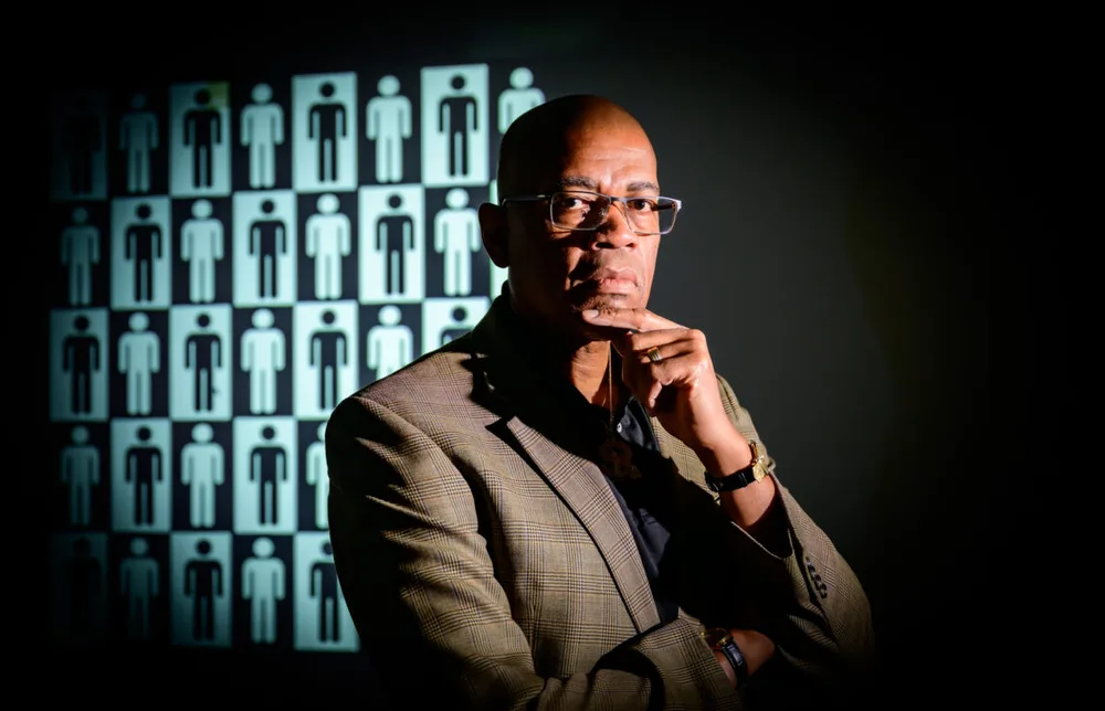 A photo of Dr. Reuben May