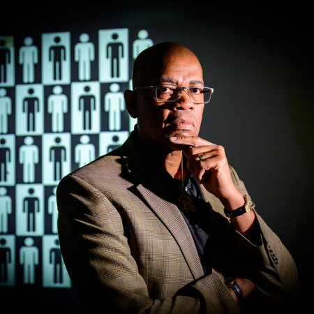 A photo of Dr. Reuben May