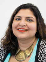 A photo of Urooj Arshad smiling at the camera
